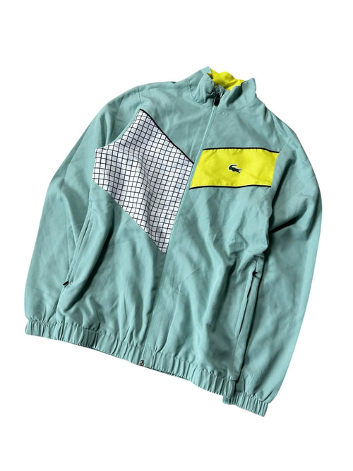 modadeclase Vintage Lacoste Trainingsjacke in Mintgrün mit gelben und schwarz-weißen Karomuster-Kontrastpaneelen