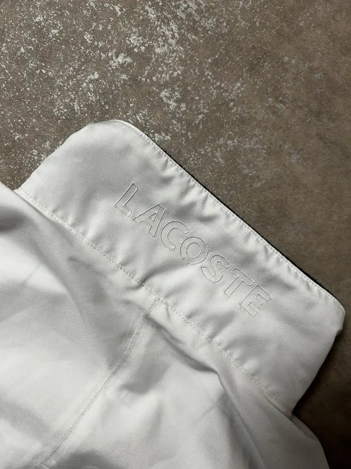 Vintage Lacoste Trainingsshorts Weiß – Rot & Marineblau Streifendetail | Größe FR 3 / 174 (Passt M) – Detailansicht