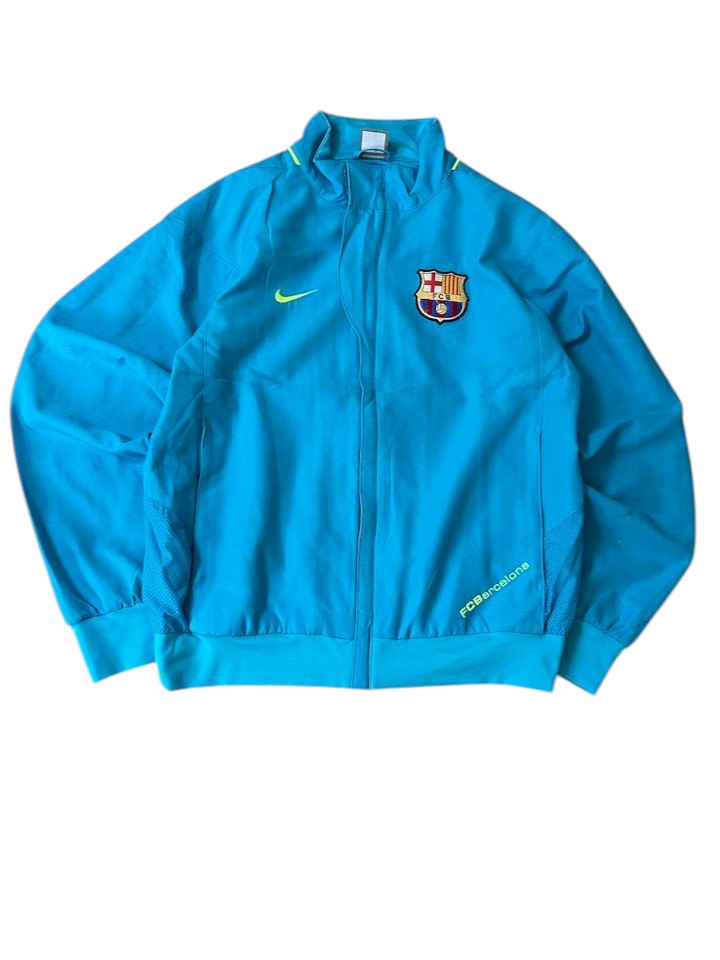 Nike x FC Barcelona Trainingsjacke Türkis Vorderseite FCB-Wappen Swoosh